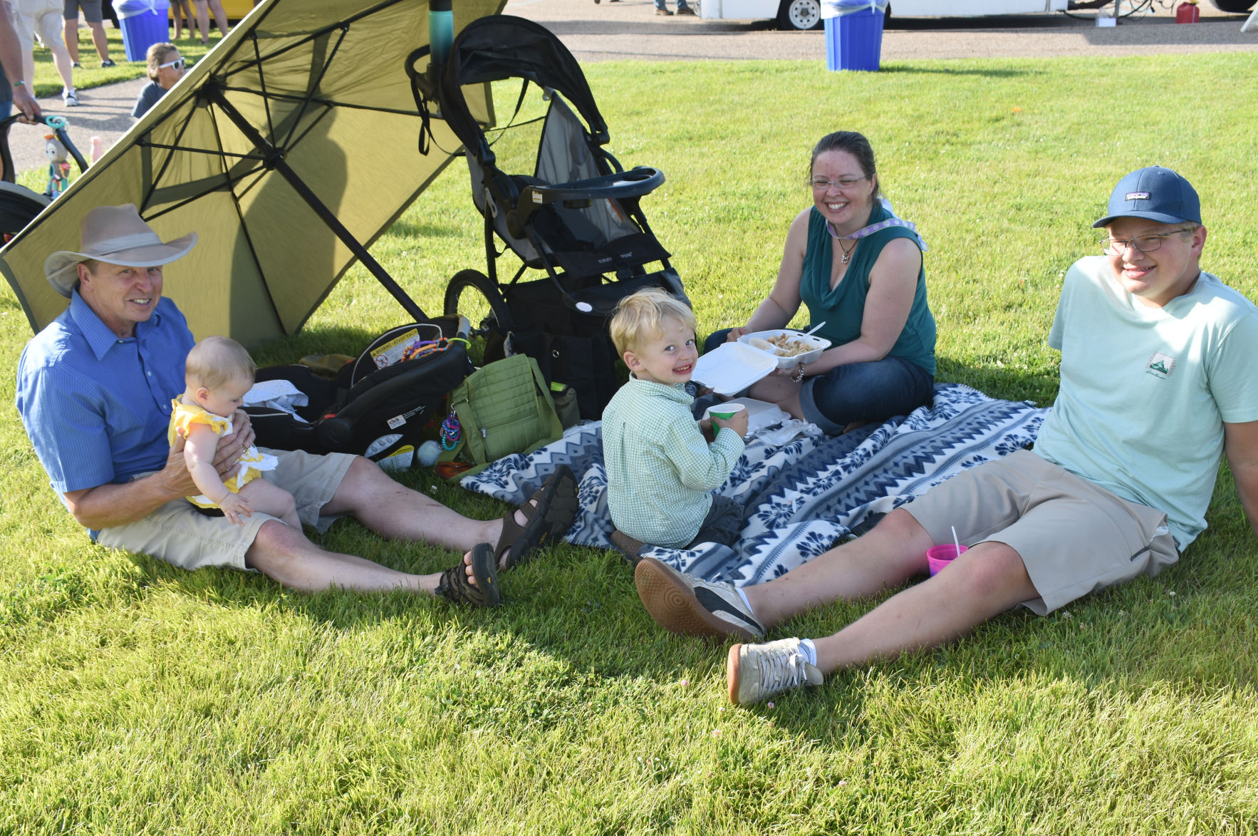 family under umbrella.jpg